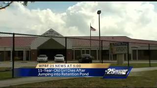 Girl drowns after jumping in pond to retrieve backpack