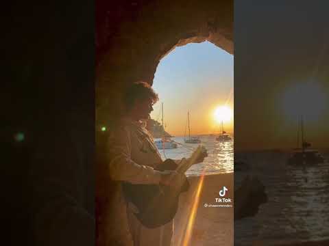 Shawn Mendes singing "Summer of Love" on a beach in Mallorca, Spain