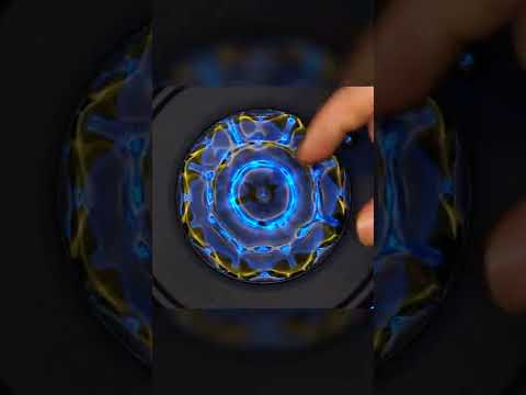 Yes it’s real! Water, light and sound! Cymatics - Touching the vibrating water -