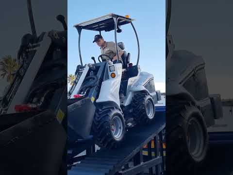 Loading New CL40 Compact Loader For Delivery