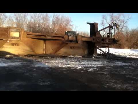 2/11/14 hopper car being cut in Oconto Falls