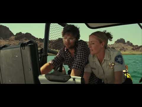 Trailer tag: aerial of the lake as bass thumps give way to ominous low-end rumble