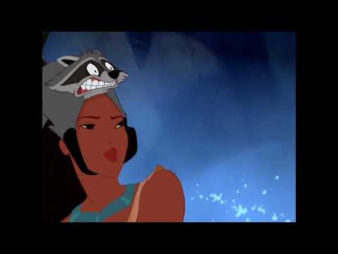 Pocahontas (1995) trailer still: Pocahontas on a cliff as wind lifts autumn leaves