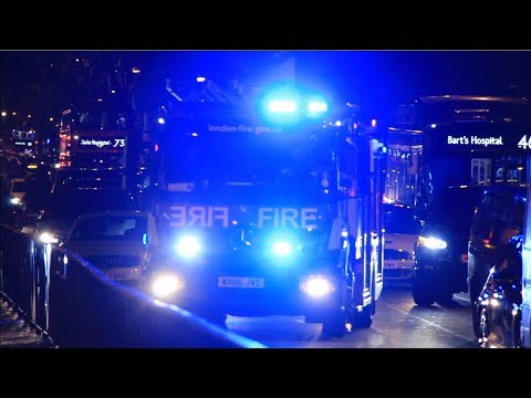 London Fire Brigade responding through heavy traffic w/bullhorn