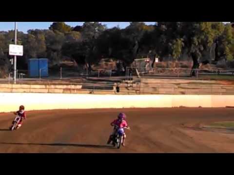 6 yo Ethan on his 50cc speedway  bike showing  4 1/2yo sister Tamika his style