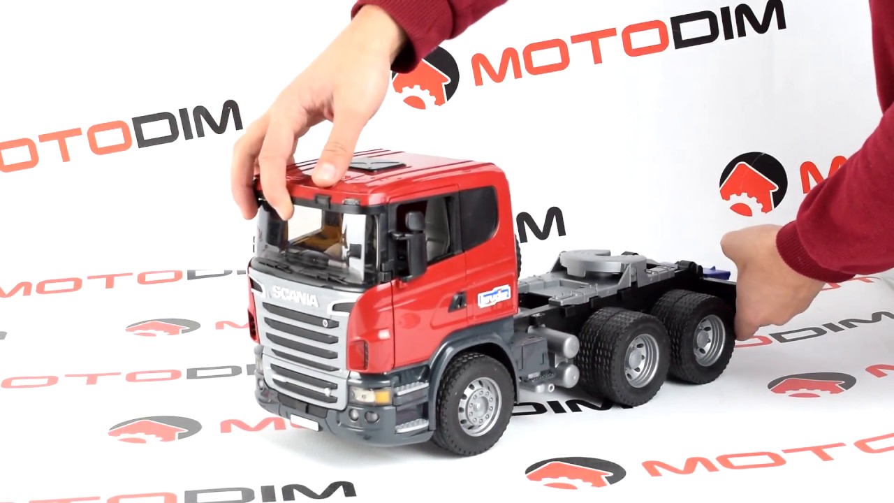 Bruder Тягач с прицепом–платформой Scania с гусеничным бульдозером CAT 03-555