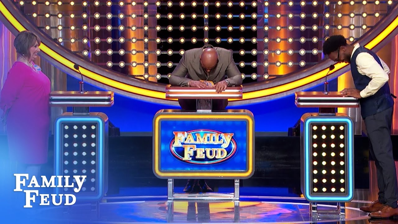 Steve Harvey breaks down in tears at the podium.