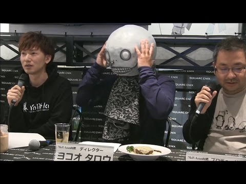 NieR: Automata Director Yoko Taro Removes His Mask (Not really... Hideki Kamiya Gag)