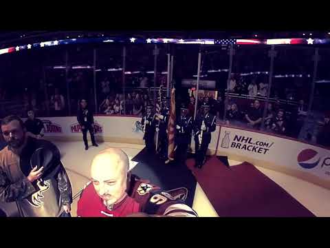 View from the ice as NHL Arizona Coyotes fans sing the National Anthem