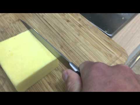 Making chainsaw noises while cutting cheese