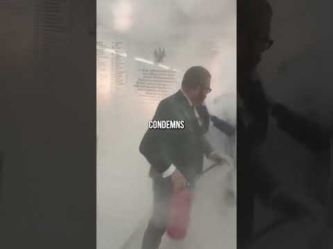 Polish MP Sprays Fire Extinguisher At Hanukkah Display