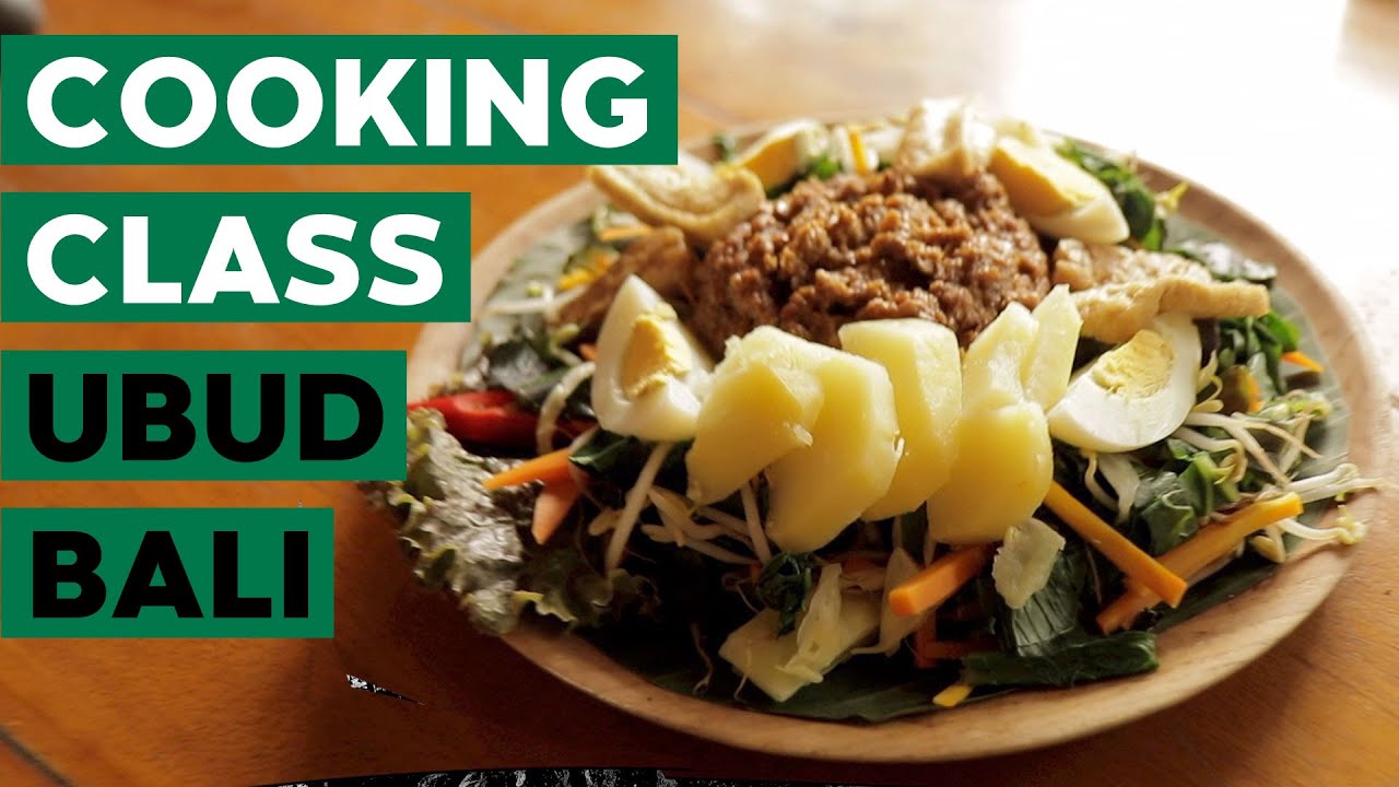 A tourist participates in Tempeh Making Workshop.