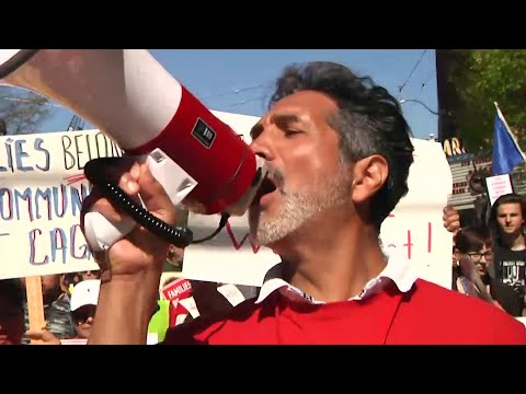 Marchers took to the streets in Seattle for the annual May Day demonstration. For the 20th year, the May Day featured a March for Immigrant and Workers Rights. Marchers also went through the heart of Amazon's sprawling campus. (May 1)