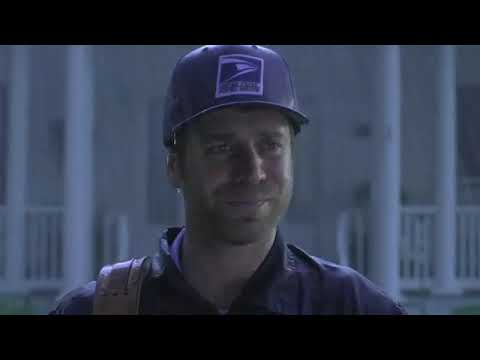 Trailer image: neighborhood vigil at dusk, soft backlight, underscored by piano figure