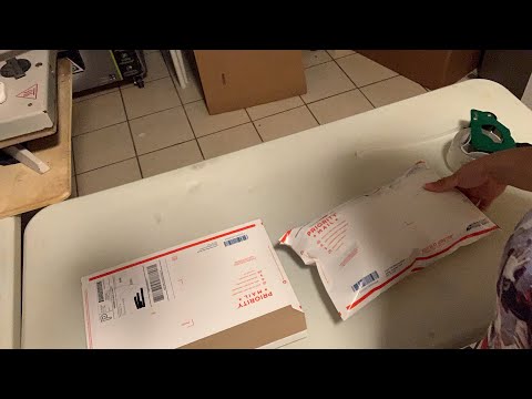 Part of a video titled How to pack a USPS flat rate envelope stuff sweatshirts six extra ...