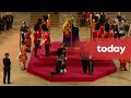 Royal guard collapses next to Queen’s coffin on first night of lying in state