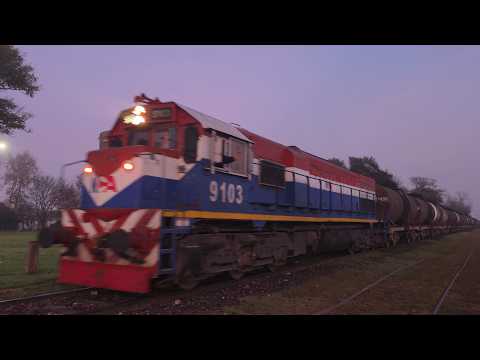 [8K] Tren cargado de NCA con la EMD GT-22CW 9103 pasando por Marcos Juárez al amanecer!!!!!!