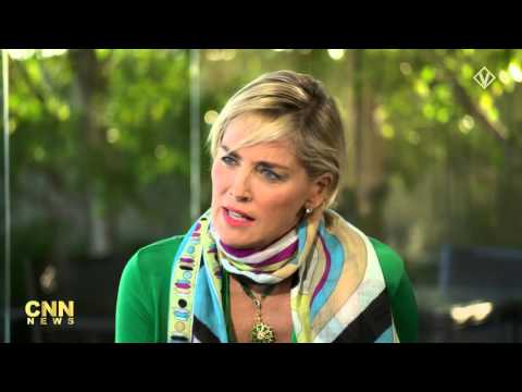 Kristian Valen as CNN "Richard Quest" talking to Sharon Stone