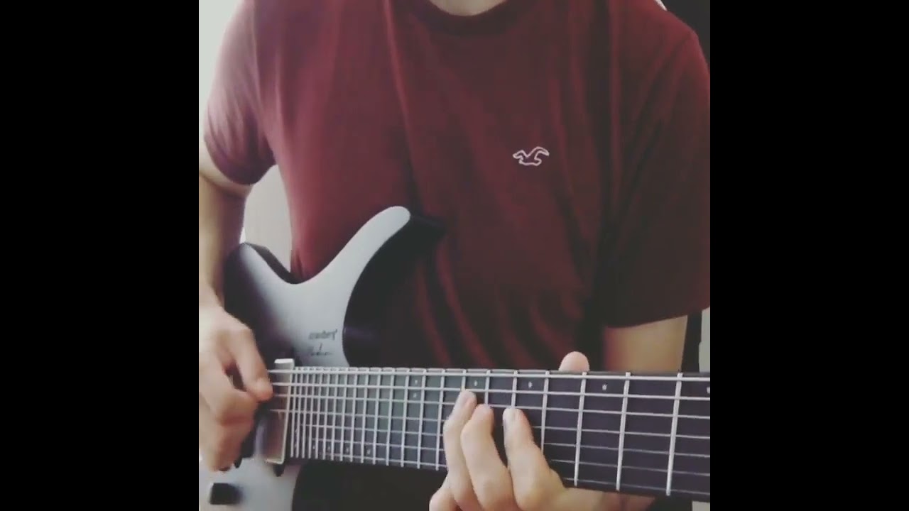 Roberto Barlocci fingerpicking and playing a solo snippet on guitar over an original song