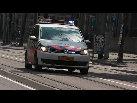 PRIO 1 Politie over de Plantage Middenlaan in Amsterdam naar een Melding