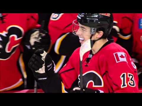 Stajan breaks tie late, Flames comeback to eliminate Canucks