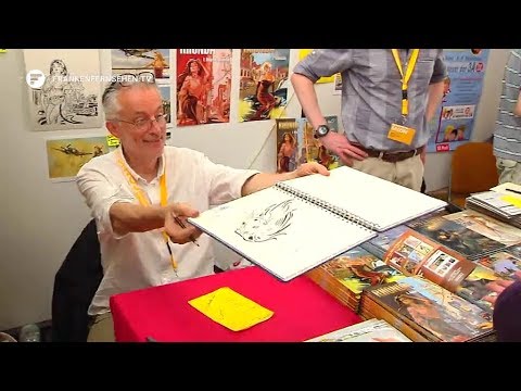 Buntes Lebensgefühl auf dem 18. Internationalen Comic-Salon - Zeichner Vano signiert