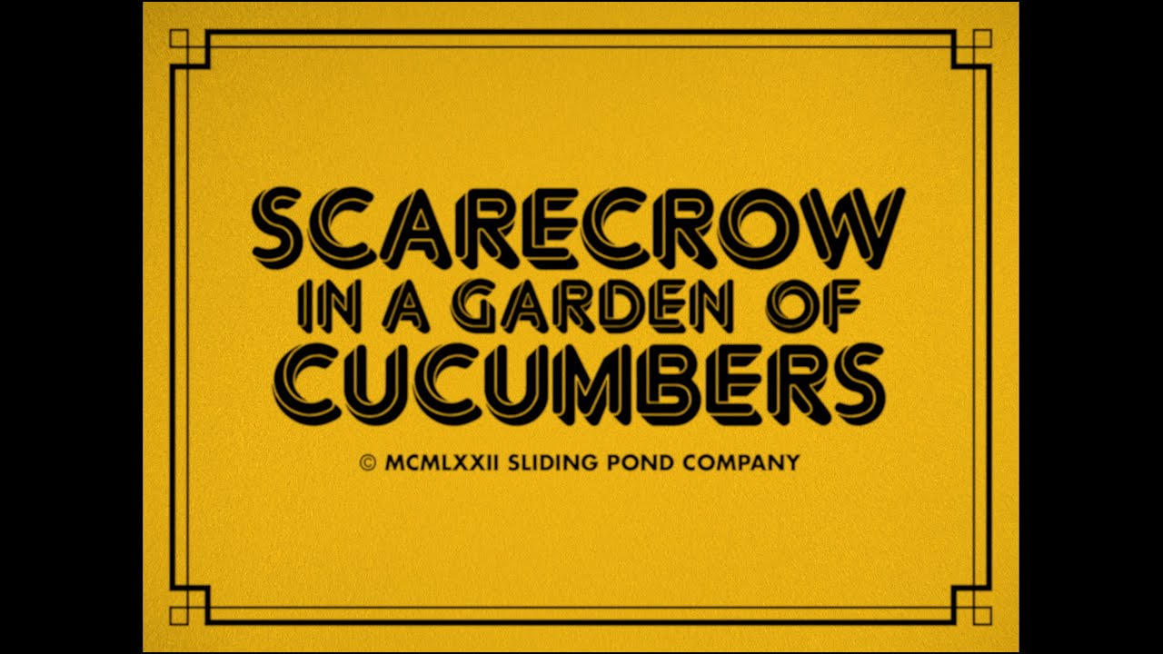 Scarecrow in a Garden of Cucumbers