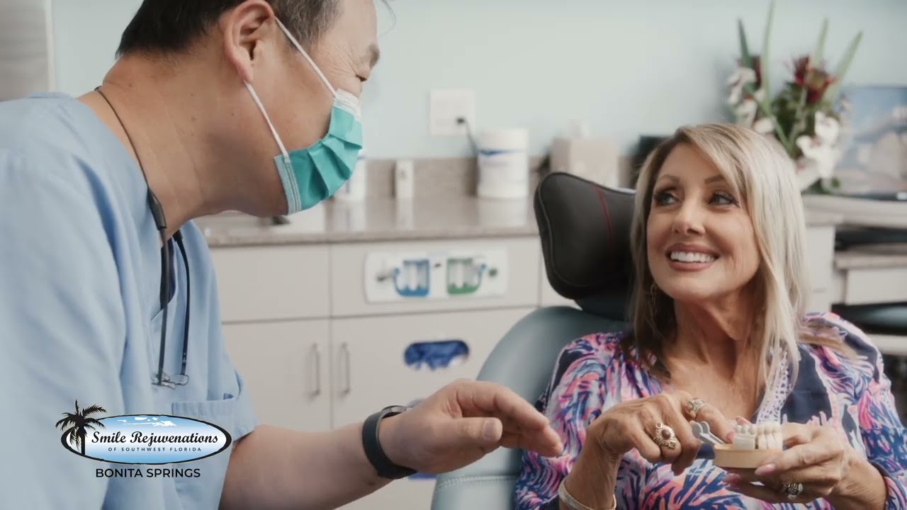 Estero Florida dentist showing a dental patient a model of the teeth