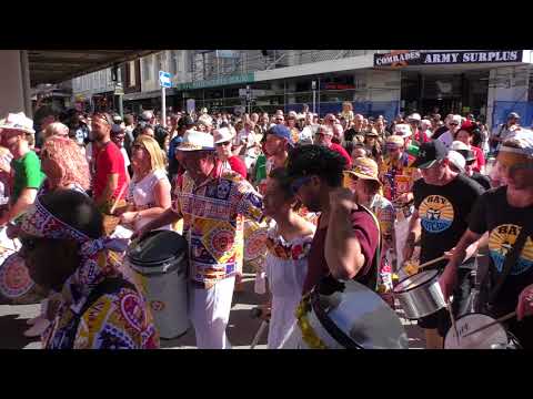 CubaDupa 2018 day 2 - Mass samba bloco parade arrives at Swan Stage