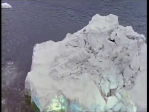 Godzilla breaks out of an iceberg