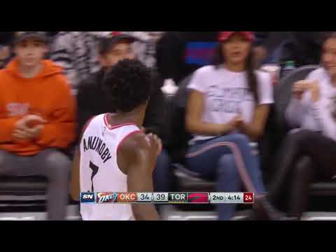 Toronto Raptor OG Anunoby literally bends the metal rim with unbelievable strength on pullback dunk.