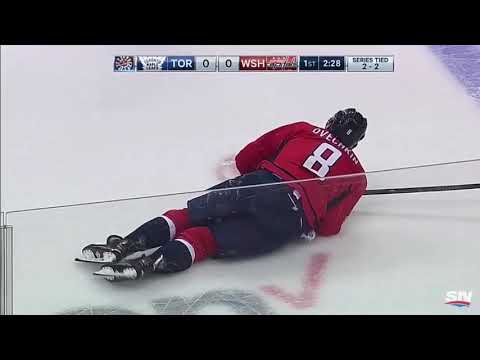 Ovi gets helped off the ice from bad hit by Kadri