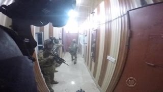 New helmet cam video of raid on ISIS