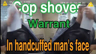 Cop Shoves paper in man’s face asking to see warrant! Body camera