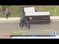 UPS driver shot dead behind the wheel of parked van in Orange County