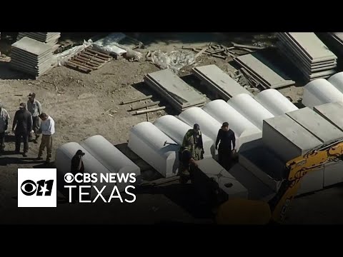Man pinned under burial vault in Dallas dies