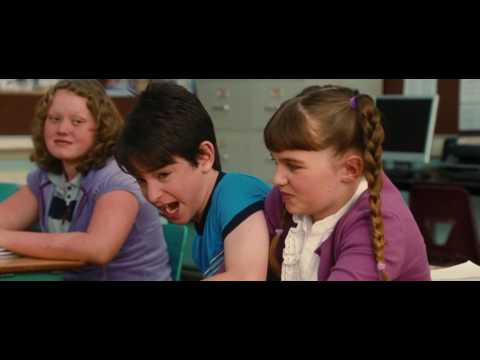 The boy grabbed seats with others at the first day of school, the boy was on the list of his teacher