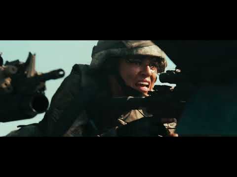 Battle: Los Angeles official trailer frame with Marines advancing through smoke-lit streets