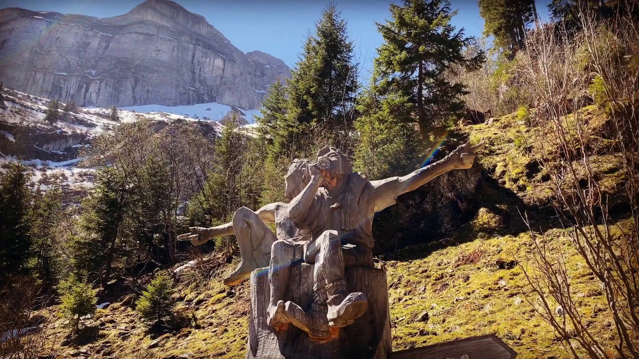 Embark on a virtual journey from Axalp Woodcarving Trail to the serene Hinterburgsee.