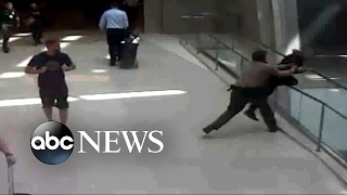 Airport security officer hailed a hero for thwarting man's apparent suicide attempt