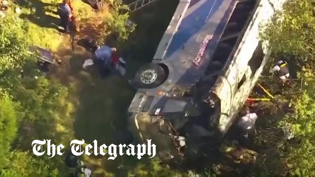 New York bus crash Two dead after bus carrying high school band falls