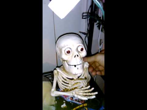 Iron skeleton mechanical coin bank