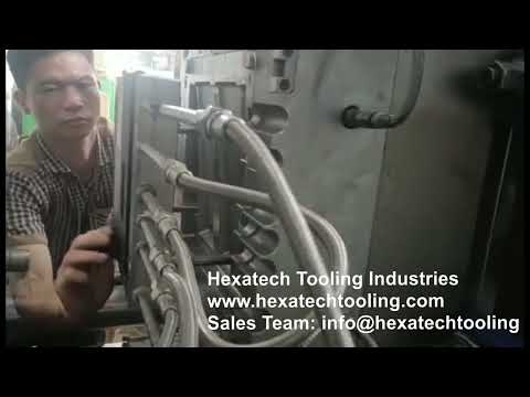 Hexatech Tooling Industries - Plastic Injection Molding Service. Injection machine in action.