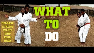 Self-defense moves for release of strong waist grip from the back