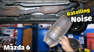 Mazda 6 or 3 making Rattling noise  check under exhaust shield loose