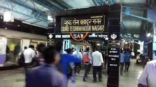 preview picture of video 'See the people touching with grace to the name of the station written with respect in Mumbai'