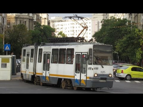 Romania: In Bucharest STB route 45 & 46 trams are seen near Gara de Nord railway station.