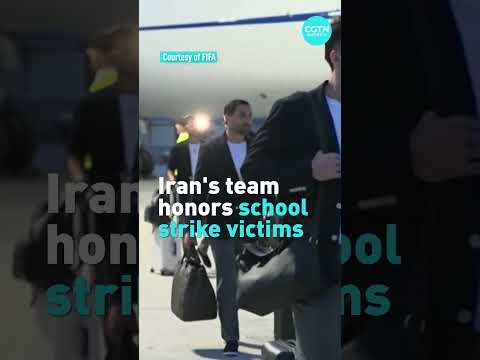 Iranian national soccer team arrives wearing pins commemorating deadly strike on school