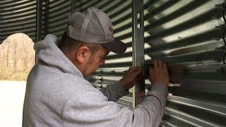 Installing Metal framing for bottom level of Grain Bin House E15