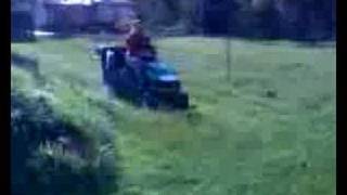 preview picture of video 'First go with a John Deer Tractor mower'